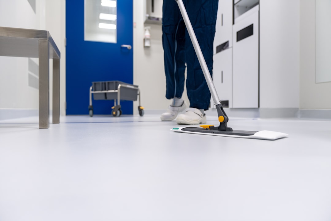 services-04 Cleaner cleaning the floor in a laboratory environment